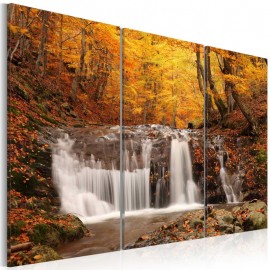 Quadro - A waterfall in the middle of fall trees
